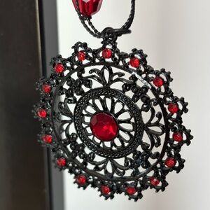 Gun Metal Black Open Filigree Round Medallion Pendant Necklace- Red Rhinestones